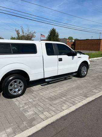 White Ford F150 XLT – $11,000