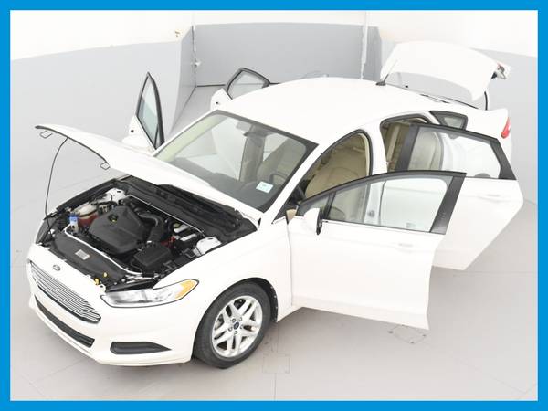 2013 Ford Fusion SE Sedan 4D sedan White – FINANCE ONLINE – $16,990 (TOUCHLESS DELIVERY TO YOUR HOME)